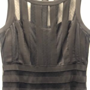 White House Black Market Swiss Dot and Mesh Neckline Black Dress.